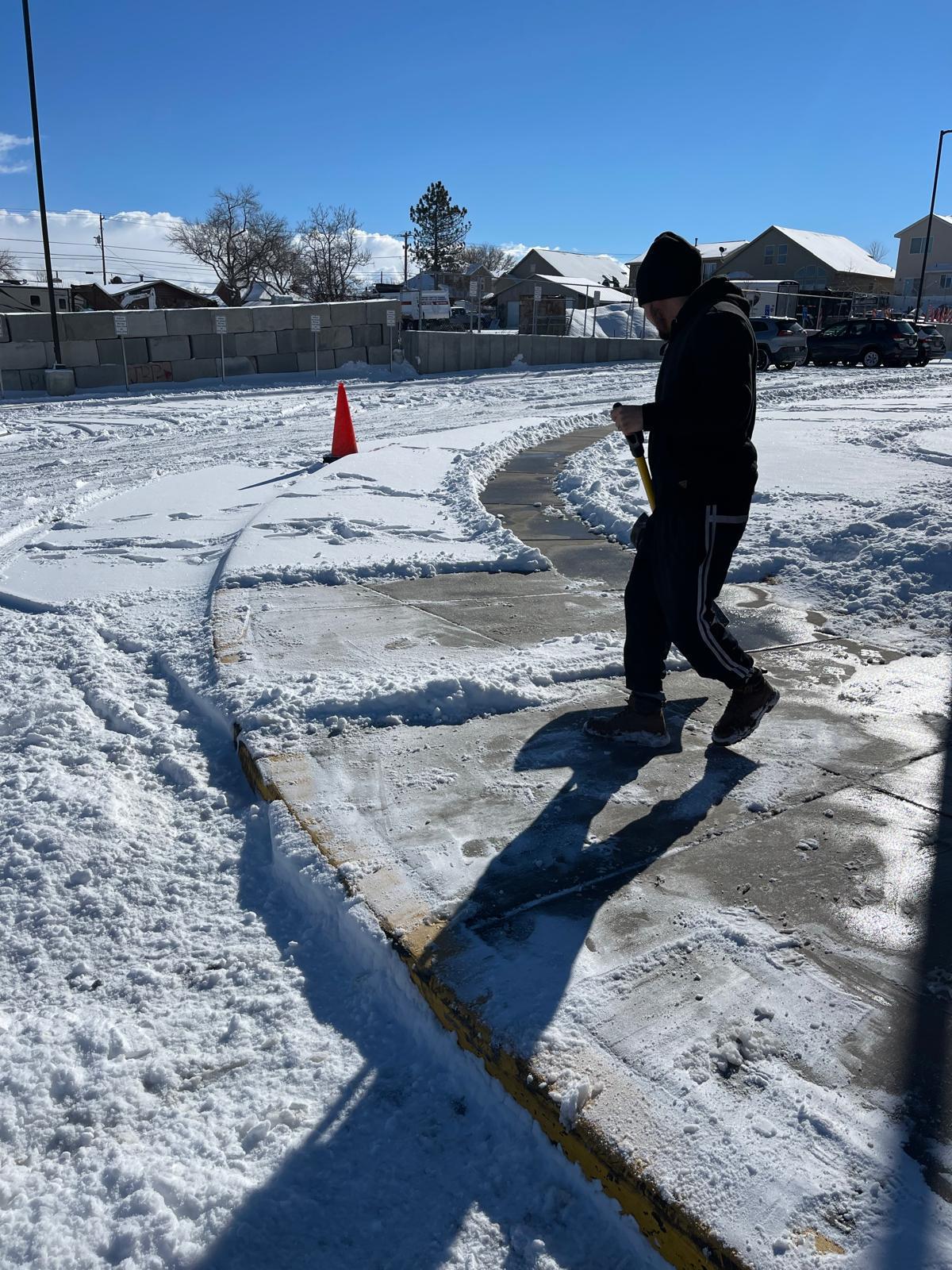 Ice chipping on parking lot