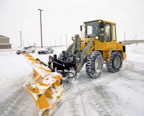 Backhoe on landscape installation site